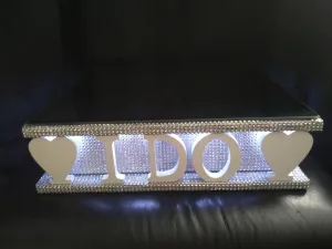 I DO wedding cake stand   lights carved wooden words wedding cake stand   lights by Crystal wedding uk